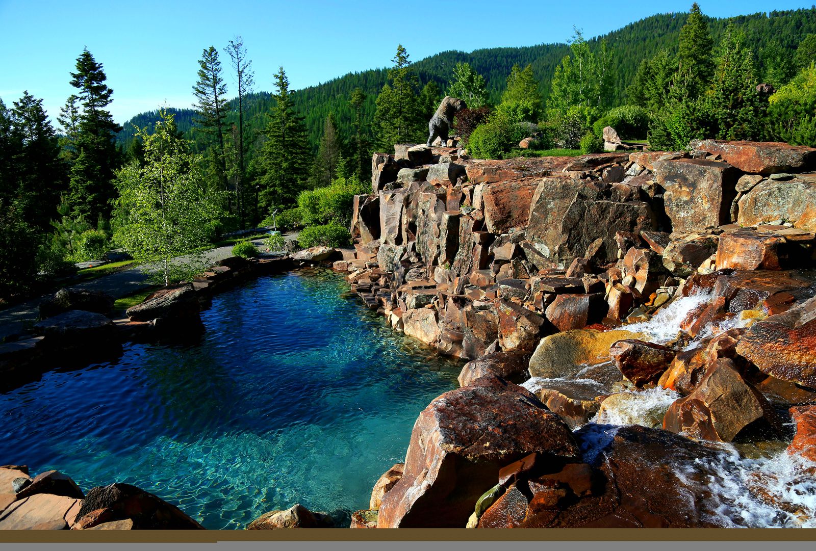 Quarry swimming pool carved into native stone, Whitefish, Montana